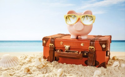 suitcase with piggy bank